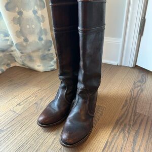 Frye brown leather boots. Easy pull on style. Worn leather distressed style.